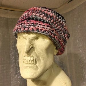 Hand-made knitted multicolored beanie.